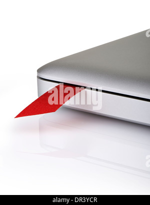 close-up on a red ribbon used as bookmark in a laptop Stock Photo