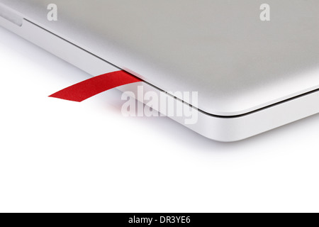 close-up on a red ribbon used as bookmark in a laptop Stock Photo