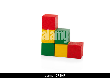 Wooden blocks, pyramid of colorful cubes, childrens toy isolated on white background Stock Photo