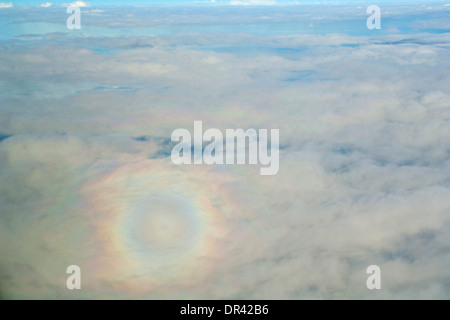Spectre of the Brocken on Alto Cumulus clouds over the Pacific Ocean Stock Photo