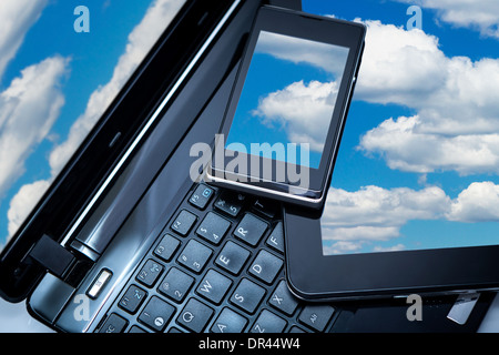 Cloud computing connection on digital tablet pc and modern smart phone. Stock Photo