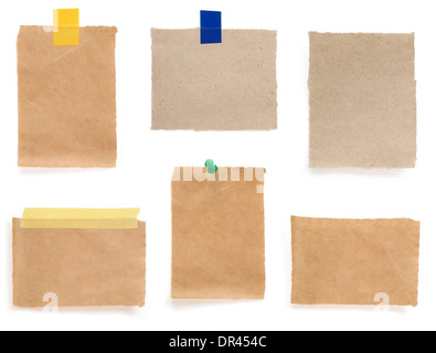 pushpin and wrapped paper isolated on white background Stock Photo