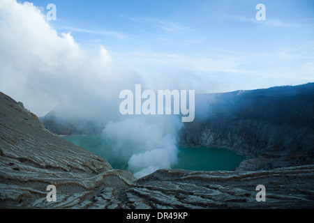 Sulphatic lake in a crater of volcano Ijen, Java, Indonesia Stock Photo ...