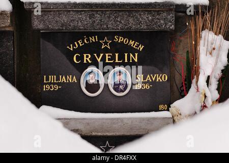 Jan 19, 2009 - Belgrade, Serbia - A monument of funeral orchestra bendmaster Slavko Crvelin and his wife Ljiljana at the cemetery. In Serbia's capital there are two brass-bands named 'Ivan Gerov', covering all the cemeteries. Crvelin a trumpet player and bandmaster of a funeral orchestra is a retired lieutenant-colon and prior conductor in ex-Yugoslavia TITO's marching band. Custom Stock Photo