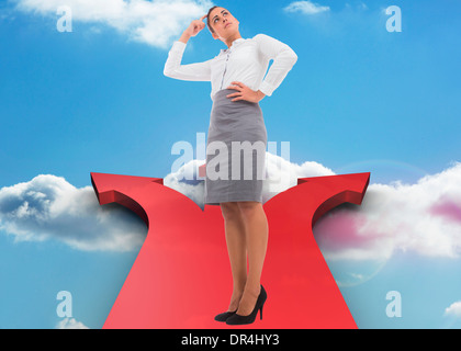 Composite image of focused businesswoman Stock Photo