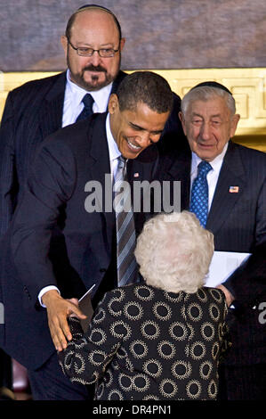 President Barack Obama gives a hug to Dallas nurse Nina Pham in the ...