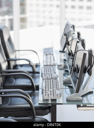 Chairs, computers and headset in modern office Stock Photo