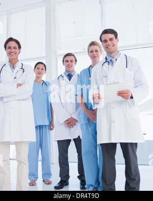 Young doctors standing together at hospital Stock Photo