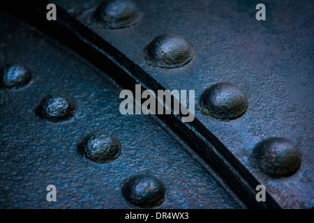Close up of rivets on sheet metal Stock Photo