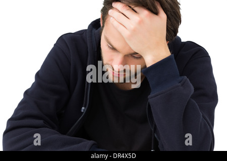 Close-up of a stressed handsome young man Stock Photo