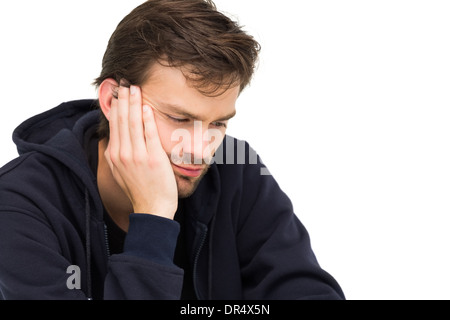 Close-up of a stressed handsome young man Stock Photo