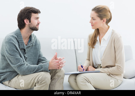 Young man in meeting with a financial adviser Stock Photo