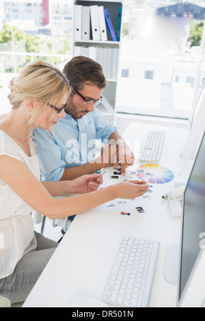 Photo editors working on computers Stock Photo