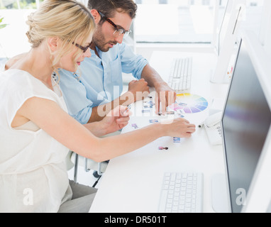 Photo editors working on computers Stock Photo
