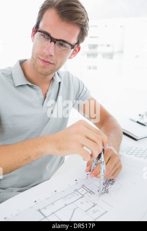 Man using compass on design Stock Photo