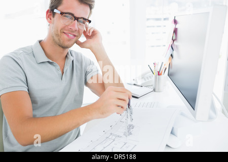 Man using compass on design Stock Photo