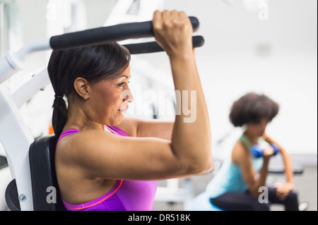 African American woman working out in gym Stock Photo