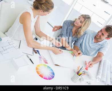 Group of artists working on designs Stock Photo