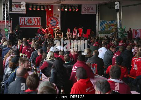 Glonn, Germany. 19th Jan, 2014. HANDOUT - A handout picture shows Josep Guardiola (C, back), head coach of FC Bayern Munich, talking to the guests and fans during his visit of FC Bayern Munich Fan Club 'Glonn 94' in Glonn, Germany, 19 January 2014. Photo: Alexander Hassenstein/FCB/Bongarts/Getty Images/dpa/Alamy Live News