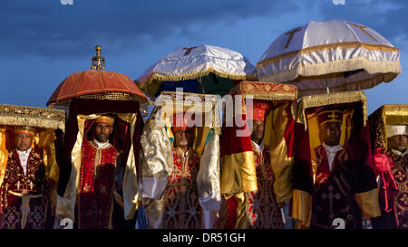 Addis Ababa, Ethiopian . 18th Jan, 2014. Priests carry the Tabot, a model of the Arc of Covenant, during a colorful procession of Timket celebrations of Epiphany, commemorating the baptism of Jesus, on January 18, 2014 in Addis Ababa. Credit:  Dereje Belachew/Alamy Live News Stock Photo