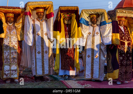 Addis Ababa, Ethiopian . 18th Jan, 2014. Priests carry the Tabot, a model of the Arc of Covenant, during a colorful procession of Timket celebrations of Epiphany, commemorating the baptism of Jesus, on January 18, 2014 in Addis Ababa. Credit:  Dereje Belachew/Alamy Live News Stock Photo