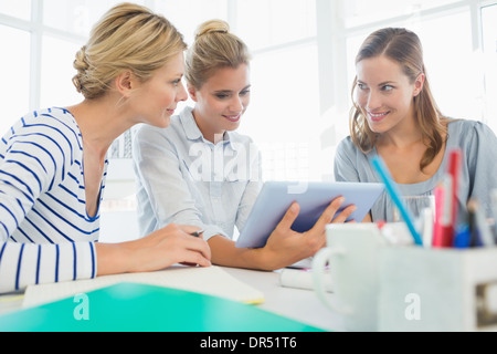 Group of artists using digital tablet Stock Photo