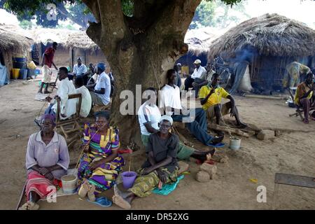 Jan 17, 2009 - Lira, Uganda - Inhabitants of a refugee camp in Uganda. Civil war has resulted in hundred of thousands of displaced people who have settled in makeshift houses. Aid agencies provide water for drinking. (Credit Image: © Ton Koene/ZUMAPRESS.com) Stock Photo