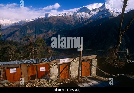 Outdoor showers with a magnificent Himalayan view on the Annapurna Sanctuary trekking route in central Nepal. Stock Photo