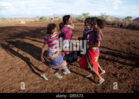 Ethiopian nomad family with their hut and animals Stock Photo