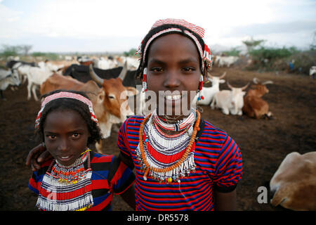 Ethiopian nomad family with their hut and animals Stock Photo