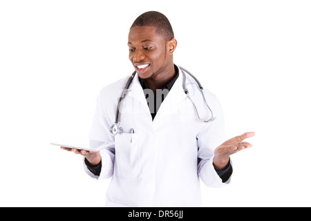 Smiling doctor using a tablet computer isolated on a white background Stock Photo