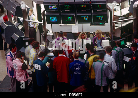 Active trading inside the London Stock Exchange in the City of London during the late-eighties. Stock Photo