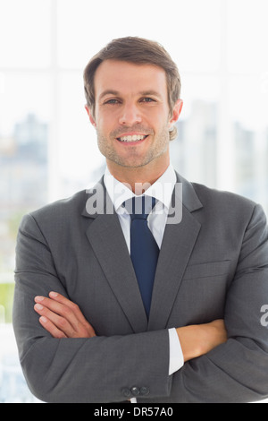 Portrait of a businessman with arms crossed outdoors Stock Photo - Alamy
