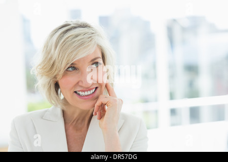 Mature businesswoman looking away Stock Photo