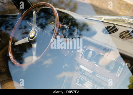 Vintage Ferrari dashboard viewed through window Stock Photo