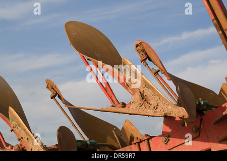 Plough shares. Kverneland RX 100. Tractor drawn agricultural machinery, used to turn soil after harvesting. Stock Photo