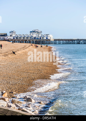 South Parade Pier, Southsea, Hampshire, UK viewed from Portsmouth with waves breaking on stony beach Stock Photo