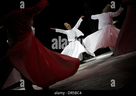 Apr 13, 2009 - Costa Mesa, California, USA - The Whirling Dervishes perform at the 2009 Anatolian Cultures and Food Festival sponsored by the Pacifica Institute in Orange County. The Dervishes are a Sufi order from Konya, Turkey that whirl as a form of rememberance of God. (Credit Image: © Jon Vidar/ZUMA Press) Stock Photo