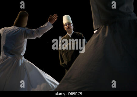 Apr 13, 2009 - Costa Mesa, California, USA - The Whirling Dervishes perform at the 2009 Anatolian Cultures and Food Festival sponsored by the Pacifica Institute in Orange County. The Dervishes are a Sufi order from Konya, Turkey that whirl as a form of rememberance of God. (Credit Image: © Jon Vidar/ZUMA Press) Stock Photo