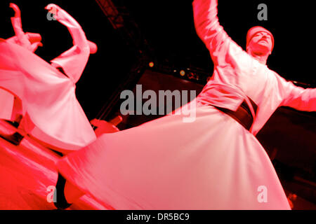 Apr 13, 2009 - Costa Mesa, California, USA - The Whirling Dervishes perform at the 2009 Anatolian Cultures and Food Festival sponsored by the Pacifica Institute in Orange County. The Dervishes are a Sufi order from Konya, Turkey that whirl as a form of rememberance of God. (Credit Image: © Jon Vidar/ZUMA Press) Stock Photo