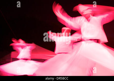 Apr 13, 2009 - Costa Mesa, California, USA - The Whirling Dervishes perform at the 2009 Anatolian Cultures and Food Festival sponsored by the Pacifica Institute in Orange County. The Dervishes are a Sufi order from Konya, Turkey that whirl as a form of rememberance of God. (Credit Image: © Jon Vidar/ZUMA Press) Stock Photo