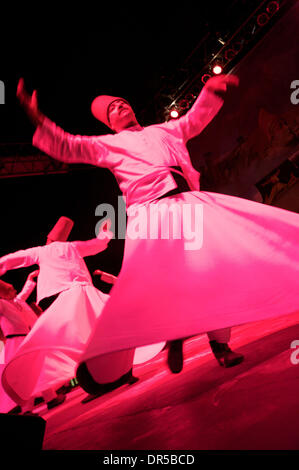 Apr 13, 2009 - Costa Mesa, California, USA - The Whirling Dervishes perform at the 2009 Anatolian Cultures and Food Festival sponsored by the Pacifica Institute in Orange County. The Dervishes are a Sufi order from Konya, Turkey that whirl as a form of rememberance of God. (Credit Image: © Jon Vidar/ZUMA Press) Stock Photo