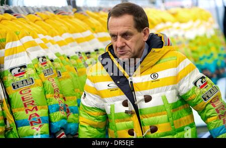 Erding, Germany. 20th Jan, 2014. Alfons Hoermann, president of the German Olympic Sports Confederation DOSB, receives his outfit during the official kitting out of the Olympic team for the Olympic Winter Games in Sochi 2014 in Erding, Germany, 20 January 2014. Photo: Sven Hoppe/dpa/Alamy Live News Stock Photo