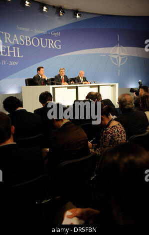Turkish Foreign Minister Ali Babacan (L) , Turkey's President Abdullah Gul and Turkish Defense Minister Vecdi Gonul (R) addresses the media during press conference at the end of the 60th NATO Summit   in  Strasbourg, France on 2009-04-04.after it was announced that Danish Prime Minister Anders Fogh Rasmussen will be the next NATO Secretary General, succeeding current Secretary Gene Stock Photo
