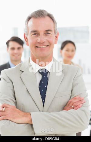 Mature businessman smiling at camera Stock Photo