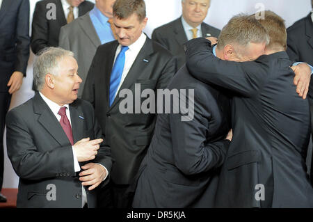 Mar 19, 2009 - Brussels, Belgium - Polish president LECH KACZYNSKI (left) watches as Czech Prime Minister MIREK TOPOLANEK (center) greets Slovak Prime Minister ROBERT FICO (right) during the group photo on the first day of the European Heads of State Summit. (Credit Image: © Wiktor Dabkowski/ZUMA Press) Stock Photo
