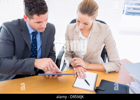 Smartly dressed colleagues in business meeting Stock Photo