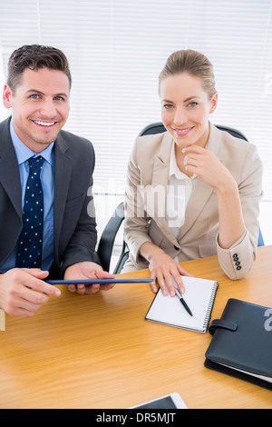 Smartly dressed colleagues in business meeting Stock Photo