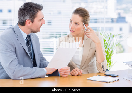 Smartly dressed colleagues in business meeting Stock Photo