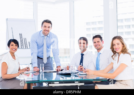 Business people in office at presentation Stock Photo